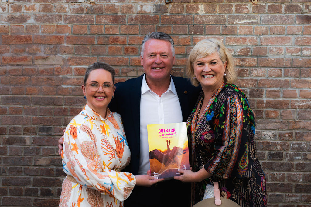 Natalie Flecker, Minister Healy and Denise Brown with the 2024 Traveller's Guide